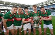 2 April 2023; Mayo players, from left, Jordan Flynn, Jason Doherty, Sam Callinan, Jack Carney and Fionn McDonagh with the cup after the Allianz Football League Division 1 Final match between Galway and Mayo at Croke Park in Dublin. Photo by Ramsey Cardy/Sportsfile