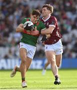 2 April 2023; Tommy Conroy of Mayo in action against Cathal Sweeney of Galway during the Allianz Football League Division 1 Final match between Galway and Mayo at Croke Park in Dublin. Photo by Ramsey Cardy/Sportsfile