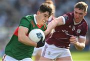 2 April 2023; Tommy Conroy of Mayo in action against Jack Glynn of Galway during the Allianz Football League Division 1 Final match between Galway and Mayo at Croke Park in Dublin. Photo by Ramsey Cardy/Sportsfile