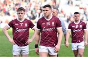 2 April 2023; Galway players, from left, Johnny McGrath, Damien Comer and Dessie Conneely dejected after their side's defeat in the Allianz Football League Division 1 Final match between Galway and Mayo at Croke Park in Dublin. Photo by Sam Barnes/Sportsfile