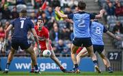 2 April 2023; Padraig McGrogan of Derry in action against Dublin players, from left, goalkeeper David O'Hanlon, Michael Fitzsimons and Brian Fenton during the Allianz Football League Division 2 Final match between Dublin and Derry at Croke Park in Dublin. Photo by Sam Barnes/Sportsfile