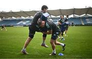 3 April 2023; Brian Deeny, left, and Scott Penny during Leinster rugby squad training at RDS Arena in Dublin. Photo by Ramsey Cardy/Sportsfile