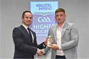 3 April 2023; Dean Mason of UL and Ballyhale Shamrocks, Kilkenny, right, receives his 2023 Electric Ireland GAA Higher Education Rising Stars Hurling Team of the Year Award from Chair of the GAA Higher Education Committee Michael Hyland during the 2023 Electric Ireland GAA HEC Rising Star Awards at the Castletroy Park Hotel in Limerick. Photo by Sam Barnes/Sportsfile