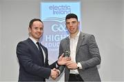 3 April 2023; TJ Brennan of UL and Clarinbridge, Galway, right, receives his 2023 Electric Ireland GAA Higher Education Rising Stars Hurling Team of the Year Award from Chair of the GAA Higher Education Committee Michael Hyland during the 2023 Electric Ireland GAA HEC Rising Star Awards at the Castletroy Park Hotel in Limerick. Photo by Sam Barnes/Sportsfile
