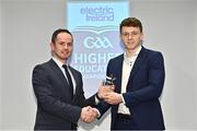 3 April 2023; Cormac O'Brien of UCC and Newtownshandrum, Cork, right, receives his 2023 Electric Ireland GAA Higher Education Rising Stars Hurling Team of the Year Award from Chair of the GAA Higher Education Committee Michael Hyland during the 2023 Electric Ireland GAA HEC Rising Star Awards at the Castletroy Park Hotel in Limerick. Photo by Sam Barnes/Sportsfile