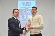 3 April 2023; Brian Concannon of University of Galway and Killimordaly, Galway, right, receives his 2023 Electric Ireland GAA Higher Education Rising Stars Hurling Team of the Year Award from Chair of the GAA Higher Education Committee Michael Hyland during the 2023 Electric Ireland GAA HEC Rising Star Awards at the Castletroy Park Hotel in Limerick. Photo by Sam Barnes/Sportsfile