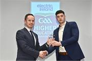 3 April 2023; Seán Twomey of UL and Courcey Rovers, Cork, right, receives his 2023 Electric Ireland GAA Higher Education Rising Stars Hurling Team of the Year Award from Chair of the GAA Higher Education Committee Michael Hyland during the 2023 Electric Ireland GAA HEC Rising Star Awards at the Castletroy Park Hotel in Limerick. Photo by Sam Barnes/Sportsfile