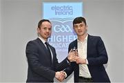 3 April 2023; Jack Coyne of UL and Ballyhaunis, Mayo, right, receives his 2023 Electric Ireland GAA Higher Education Rising Stars Football Team of the Year Award from Chair of the GAA Higher Education Committee Michael Hyland during the 2023 Electric Ireland GAA HEC Rising Star Awards at the Castletroy Park Hotel in Limerick. Photo by Sam Barnes/Sportsfile