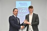 3 April 2023; Darragh Cashman of UL and Millstreet, Cork, right, receives his 2023 Electric Ireland GAA Higher Education Rising Stars Football Team of the Year Award from Chair of the GAA Higher Education Committee Michael Hyland during the 2023 Electric Ireland GAA HEC Rising Star Awards at the Castletroy Park Hotel in Limerick. Photo by Sam Barnes/Sportsfile