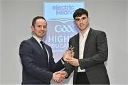 3 April 2023; Bill Carroll of DCU DÉ and Cappincur, Offaly, right, receives his 2023 Electric Ireland GAA Higher Education Rising Stars Football Team of the Year Award from Chair of the GAA Higher Education Committee Michael Hyland during the 2023 Electric Ireland GAA HEC Rising Star Awards at the Castletroy Park Hotel in Limerick. Photo by Sam Barnes/Sportsfile