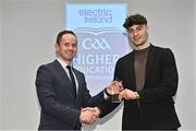 3 April 2023; Shane Merritt of UCC and Mallow, Cork, right, receives his 2023 Electric Ireland GAA Higher Education Rising Stars Football Team of the Year Award from Chair of the GAA Higher Education Committee Michael Hyland during the 2023 Electric Ireland GAA HEC Rising Star Awards at the Castletroy Park Hotel in Limerick. Photo by Sam Barnes/Sportsfile