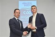 3 April 2023; Emmet Mc Mahon of UL and Kildysart, Clare, right, receives his 2023 Electric Ireland GAA Higher Education Rising Stars Football Team of the Year Award from Chair of the GAA Higher Education Committee Michael Hyland during the 2023 Electric Ireland GAA HEC Rising Star Awards at the Castletroy Park Hotel in Limerick. Photo by Sam Barnes/Sportsfile
