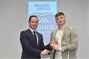 3 April 2023; Cathail O’Mahony of UCC and Mitchelstown, Cork, receives his 2023 Electric Ireland GAA Higher Education Rising Stars Football Team of the Year Award from Chair of the GAA Higher Education Committee Michael Hyland during the 2023 Electric Ireland GAA HEC Rising Star Awards at the Castletroy Park Hotel in Limerick. Photo by Sam Barnes/Sportsfile