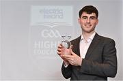 3 April 2023; In attendance during the 2023 Electric Ireland GAA HEC Rising Star Awards is Bill Carroll of DCU DÉ and Cappincur, Offaly, with his 2023 Electric Ireland GAA Higher Education Rising Stars Football Team of the Year Award at the Castletroy Park Hotel in Limerick. Photo by Sam Barnes/Sportsfile
