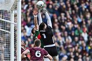 2 April 2023; Galway goalkeeper Connor Gleeson catches a high ball ahead of Jordan Flynn of Mayo during the Allianz Football League Division 1 Final match between Galway and Mayo at Croke Park in Dublin. Photo by Sam Barnes/Sportsfile