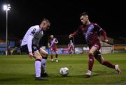 16 March 2023; Evan Weir of Drogheda United in action against Cameron Elliott of Dundalk during the SSE Airtricity Men's Premier Division match between Drogheda United and Dundalk at Weavers Park in Drogheda, Louth. Photo by Stephen McCarthy/Sportsfile