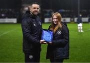31 March 2023; St Patrick's Athletic academy manager Ger O'Brien presents the U17 Women's Player of the Month award to Amber Cullen at half-time of the SSE Airtricity Men's Premier Division match between St Patrick's Athletic and UCD at Richmond Park in Dublin. Photo by Ben McShane/Sportsfile