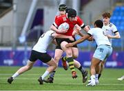 5 April 2023; Aidan McGovern of North East is tackled by Jack Byrne, left, and Callum Mulligan of Midlands during the Shane Horgan Round Five match between Midlands and North East at Energia Park in Dublin. Photo by Tyler Miller/Sportsfile
