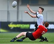 5 April 2023; Michael Dooley of Midlands is tackled by Daniel Mallon of North East during the Shane Horgan Round Five match between Midlands and North East at Energia Park in Dublin. Photo by Tyler Miller/Sportsfile