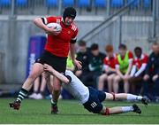 5 April 2023; Ruairi O'Neill of North East is tackled by Oisin O'Shea of Midlands during the Shane Horgan Round Five match between Midlands and North East at Energia Park in Dublin. Photo by Tyler Miller/Sportsfile