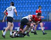 5 April 2023; Robin Hamill of North East is tackled by Sean Nolan, bottom, and Ifeoluwaleke Mogaji of Midlands during the Shane Horgan Round Five match between Midlands and North East at Energia Park in Dublin. Photo by Tyler Miller/Sportsfile