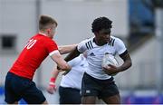 5 April 2023; Ifeoluwaleke Mogaji of Midlands in action against Ronan Hooper of Midlands during the Shane Horgan Round Five match between Midlands and North East at Energia Park in Dublin. Photo by Tyler Miller/Sportsfile