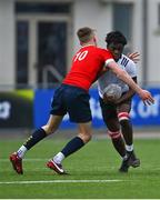 5 April 2023; Ifeoluwaleke Mogaji of Midlands is tackled by Ronan Foley of North East during the Shane Horgan Round Five match between Midlands and North East at Energia Park in Dublin. Photo by Tyler Miller/Sportsfile