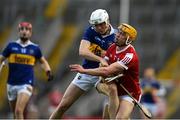 5 April 2023; Cathal Quinn of Tipperary in action against Michael Mullins of Cork during the oneills.com Munster GAA Hurling U20 Championship Round 3 match between Cork and Tipperary at Páirc Uí Chaoimh in Cork. Photo by Stephen Marken/Sportsfile