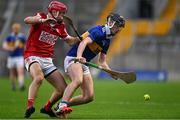 5 April 2023; Eddie Ryan of Tipperary in action against William Buckley of Cork during the oneills.com Munster GAA Hurling U20 Championship Round 3 match between Cork and Tipperary at Páirc Uí Chaoimh in Cork. Photo by Eóin Noonan/Sportsfile