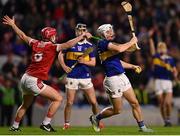 5 April 2023; Cathal Quinn of Tipperary in action against Tadhg O’Connell of Cork during the oneills.com Munster GAA Hurling U20 Championship Round 3 match between Cork and Tipperary at Páirc Uí Chaoimh in Cork. Photo by Stephen Marken/Sportsfile