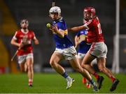 5 April 2023; Cathal Quinn of Tipperary in action against William Buckley of Cork during the oneills.com Munster GAA Hurling U20 Championship Round 3 match between Cork and Tipperary at Páirc Uí Chaoimh in Cork. Photo by Eóin Noonan/Sportsfile