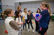 6 April 2023; Danielle Caldwell, left, and Sinéad Cafferky of Mayo with fourth grade students during a Ladies Football coaching clinic at the Casis Elementary School during the 2023 TG4 LGFA All-Star Tour to Austin in Texas, USA. Photo by Brendan Moran/Sportsfile