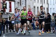 6 April 2023; The leading men's group, from left, Sean Quinn of Dundrum South Dublin AC, Mitchell Byrne of Rathfarnham WSAF AC, Dublin, Michael Harty of East Cork AC, and eventual winner Andrew Coscoran of Star of the Sea AC, Meath, compete in the Peugeot Race Series - Streets of Kilkenny 2023 in Kilkenny. Photo by Sam Barnes/Sportsfile
