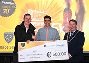 6 April 2023; Andrew Coscoran of Star of the Sea AC, Meath, centre, is presented with his prize by Morrissey Motors Peugeot Director Darragh Phelan, left, and Cathaoirleach Pat Fitzpatrick after the Peugeot Race Series - Streets of Kilkenny 2023 in Kilkenny. Photo by Sam Barnes/Sportsfile