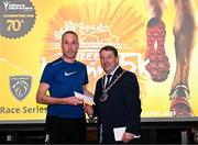 6 April 2023; Michael Harty East Cork of AC, left, who finished third, receives his prize from Cathaoirleach Pat Fitzpatrick after the Peugeot Race Series - Streets of Kilkenny 2023 in Kilkenny. Photo by Sam Barnes/Sportsfile