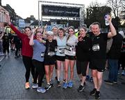 6 April 2023; Runners celebrate after finishing the Peugeot Race Series - Streets of Kilkenny 2023 in Kilkenny. Photo by Sam Barnes/Sportsfile