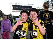 6 April 2023; Brothers Cody, left, and Zach Butler of Kilkenny City Harriers celebrate after finishing the Peugeot Race Series - Streets of Kilkenny 2023 in Kilkenny. Photo by Sam Barnes/Sportsfile