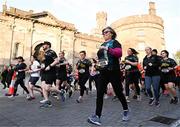 6 April 2023; Runners pass Kilkenny Castle during the Peugeot Race Series - Streets of Kilkenny 2023 in Kilkenny. Photo by Sam Barnes/Sportsfile