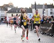 6 April 2023; Padraig Ruane of Kilkenny City Harriers, left, and Colin McDowell of NBH, right, compete in the Peugeot Race Series - Streets of Kilkenny 2023 in Kilkenny. Photo by Sam Barnes/Sportsfile