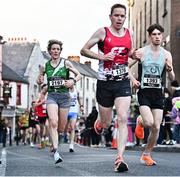 6 April 2023; Ide Nic Dhomhnaill of West Limerick AC, left, competes in the Peugeot Race Series - Streets of Kilkenny 2023 in Kilkenny. Photo by Sam Barnes/Sportsfile