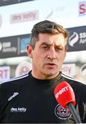 7 April 2023; Bohemians manager Declan Devine is interviewed before the SSE Airtricity Men's Premier Division match between Bohemians and Shamrock Rovers at Dalymount Park in Dublin. Photo by Seb Daly/Sportsfile
