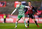 7 April 2023; Jack Byrne of Shamrock Rovers in action against Paddy Kirk of Bohemians during the SSE Airtricity Men's Premier Division match between Bohemians and Shamrock Rovers at Dalymount Park in Dublin. Photo by Seb Daly/Sportsfile