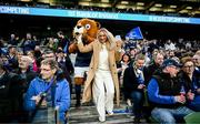 7 April 2023; Leinster mascot Leo the Lion dances with a supporter before during the Heineken Champions Cup quarter-final match between Leinster and Leicester Tigers at the Aviva Stadium in Dublin. Photo by Harry Murphy/Sportsfile