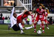 7 April 2023; Rayhaan Tulloch of Dundalk is tackled by John Mahon of Sligo Rovers, resulting in a penalty, during the SSE Airtricity Men's Premier Division match between Dundalk and Sligo Rovers at Oriel Park in Dundalk, Louth. Photo by Ben McShane/Sportsfile