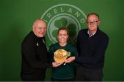 7 April 2023; Denise O'Sullivan with FAI president Gerry McAnaney, left, and FAI independent director Roy Barrett, right, after receiving her 100th Republic of Ireland cap at the team hotel in Austin, Texas, USA. Photo by Stephen McCarthy/Sportsfile