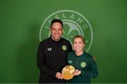 7 April 2023; Denise O'Sullivan with FAI director of football Marc Canham after receiving her 100th Republic of Ireland cap at the team hotel in Austin, Texas, USA Photo by Stephen McCarthy/Sportsfile