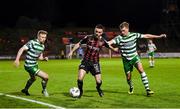 7 April 2023; Dean Williams of Bohemians in action against Sean Hoare, left, and Daniel Cleary of Shamrock Rovers during the SSE Airtricity Men's Premier Division match between Bohemians and Shamrock Rovers at Dalymount Park in Dublin. Photo by Seb Daly/Sportsfile