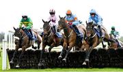 8 April 2023; Canal End, left, with Mark Walsh up, jumps the last during the first circuit, alongside, from left, Zaidi, with Michael O'Sullivan up, Mint Boy, with Keith Donoghue up, and Meranti, with Danny Mullins up, on their way to winning the Tom Quinlan Electrical Maiden Hurdle on day one of the Fairyhouse Easter Festival at Fairyhouse Racecourse in Ratoath, Meath. Photo by Seb Daly/Sportsfile