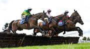 8 April 2023; Canal End, left, with Mark Walsh up, jumps the last during the first circuit, alongside Zaidi, centre, with Michael O'Sullivan up, and Mint Boy, right, with Keith Donoghue up, on their way to winning the Tom Quinlan Electrical Maiden Hurdle on day one of the Fairyhouse Easter Festival at Fairyhouse Racecourse in Ratoath, Meath. Photo by Seb Daly/Sportsfile