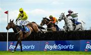 8 April 2023; Annamix, right, with Charlie Mullins up, jumps the last on their way to winning the Low.ie Hunters Steeplechase, from Billaway, left, with Patrick Mullins up, and Ferns Lock, centre, with Barry O'Neill up, on day one of the Fairyhouse Easter Festival at Fairyhouse Racecourse in Ratoath, Meath. Photo by Seb Daly/Sportsfile